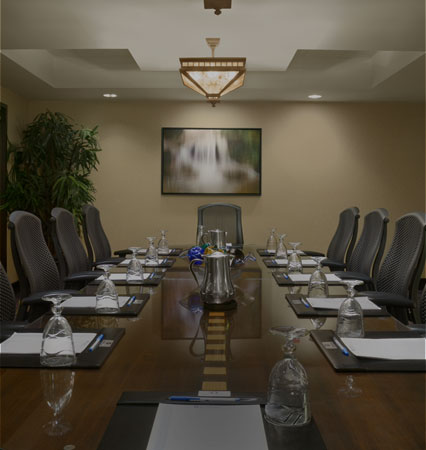 Meeting Table with Black Chairs