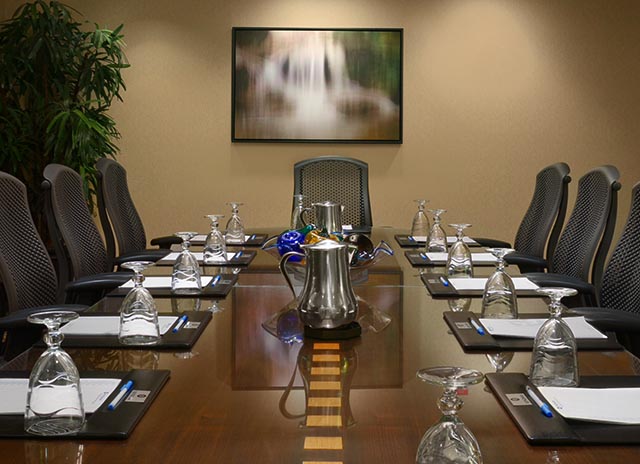 Meeting Table with Black Chairs

